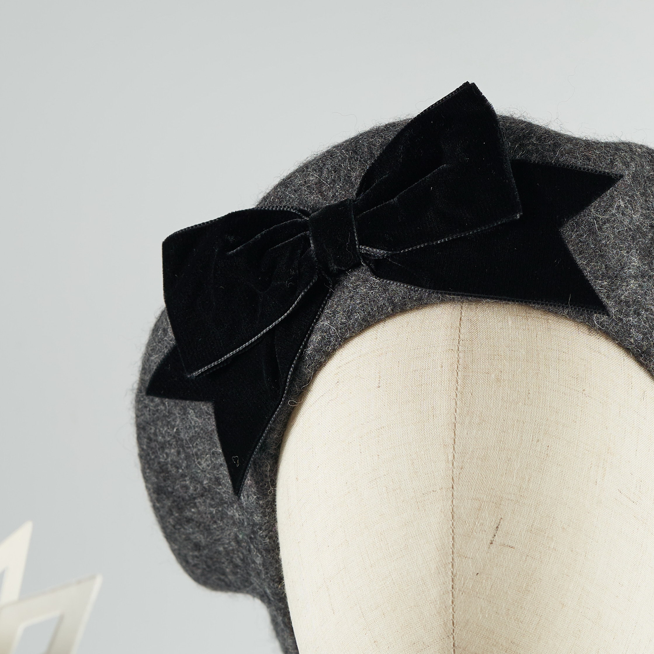 Grey And Charcoal Black Hat With A Grey Bow
