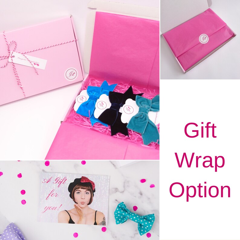 May include: A pink gift box with a white ribbon and a small tag that says "A Gift for you!"  The box is open and filled with pink tissue paper. Inside the box are four velvet hair bows in blue, black, and teal.