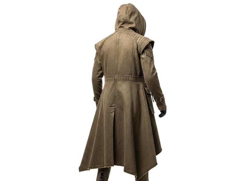May include: A brown hooded coat with a unique design. The coat features a long, flowing skirt, a belted waist, and shoulder accents. The sleeves are long, and the coat appears to be made of a textured fabric. The model is wearing black gloves.