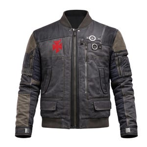 May include: A distressed-look bomber jacket in shades of gray and brown, featuring a red emblem on the chest. The jacket has multiple pockets, quilted detailing on the sleeves, and a ribbed collar and cuffs. It has a zipper closure and metal accents.