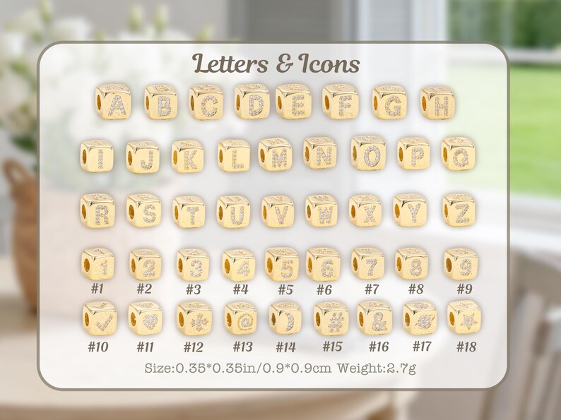 May include: Gold-colored cube beads with letters, numbers, and icons. Each cube has a letter or symbol with a clear gem. The image includes the text "Letters & Icons" and size details: 0.35*0.35 inches.