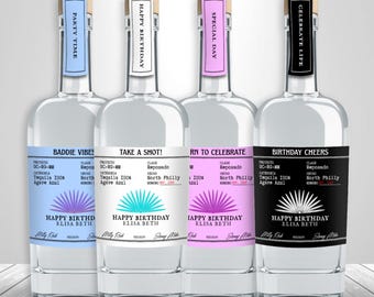 May include: Four tequila bottles with various labels. The labels read "Baddie Vibes", "Take a Shot!", "Rn to Celebrate", and "Birthday Cheers". Each bottle has a different coloured label and a matching top label that reads "Party Time", "Happy Birthday", "Special Day", and "Celebrate Life".