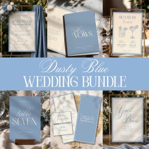 May include: A collection of dusty blue wedding stationery, including signs, vow books, menus, and guest book displays. The signs feature elegant calligraphy and the text "Unplugged Ceremony," "Table Seven," and "Guest Book."