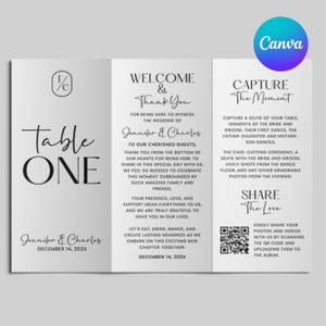 May include: A tri-fold wedding program with black text on a white background. The program includes the words "Table ONE", "Welcome & Thank You", and "Capture The Moment". It also features the names "Jennifer & Charles" and a QR code.