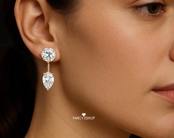 Pendientes colgantes de diamantes cultivados en laboratorio: diamantes redondos talla pera en oro amarillo de 14 quilates.