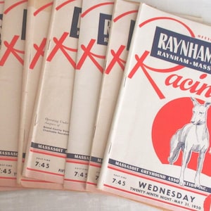 May include: A collection of vintage Raynham Park Racing programs. The covers are cream-colored with red and blue text and graphics. The programs feature a greyhound illustration and the text "Racing". The date is Wednesday, May 31, 1950.