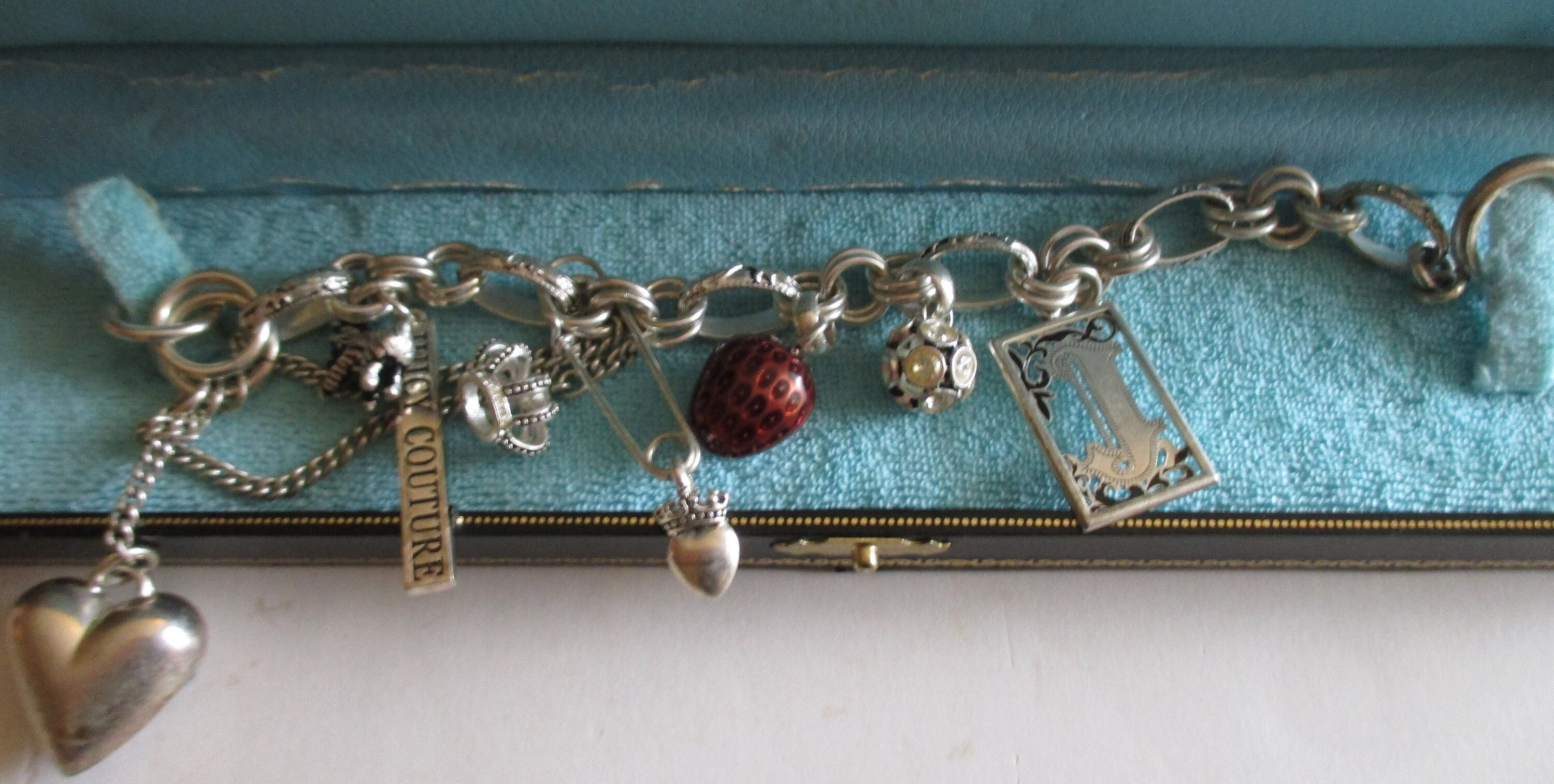 Juicy Couture Charm Bracelet Original Box Packaging Eight Silvertone Charms  Vintage Costume Jewelry 