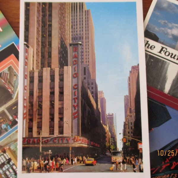 Six New York City Postcards Unused Collection Twin Towers Radio City Music Hall Ellis Island Four Seasons Greenwich Village