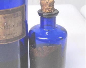 Price is for -1- bottle. Antique Cobalt Blue Apothecary Glass Bottle  Original Label