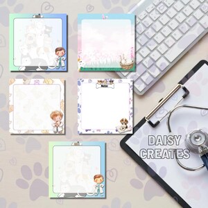 May include: A selection of square notepads with pet-themed illustrations. Each notepad features a different design, including dogs, cats, and bunnies. The notepads have a doctor character and the text "Notes". A stethoscope and keyboard are also visible.