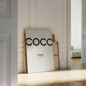 May include: A set of three ceramic mugs with a speckled, matte finish. The mugs are in shades of cream, light gray, and dark gray. Each mug has a simple, minimalist design, perfect for coffee or tea.