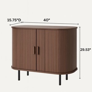 May include: A brown cabinet with two doors and vertical ribbed detailing. The cabinet is 40 inches wide, 15.75 inches deep, and 29.53 inches tall. It has black legs and handles.