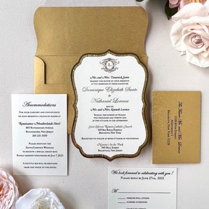 May include: Elegant wedding invitation suite with gold accents. Includes a main invitation with ornate gold border, RSVP card, accommodation details, and a gold envelope. The invitation features the names Dominique Elizabeth Santo and Nathaniel Lorence.