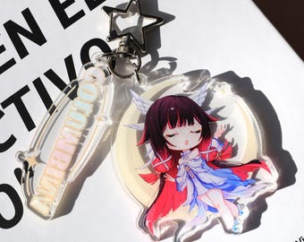 Genshin Impact Colombina acrylic keychain and backpack charm, featuring a chibi design, perfect for anime fans as daily accessory for keys