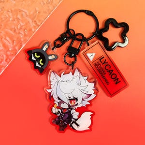 May include: A black metal keychain featuring three acrylic charms: a small black rabbit-like head with green eyes, a larger white-haired wolf character in a dark outfit, and a rectangular orange tag with the text LYCAON VICYORIA HOUSEKEEPING.