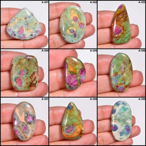 May include: Nine polished gemstones in various shapes, featuring green, pink, and brown hues. Each stone displays unique patterns and textures. The gemstones are presented against a neutral backdrop, showcasing their individual characteristics.
