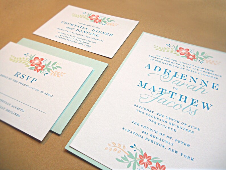 May include: Wedding invitation with floral design in shades of pink, orange, and green. The invitation reads "Mr. and Mrs. Vincent Crawford request the honour of your presence at the marriage of their daughter Adrienne Sarah to Matthew Jacobs Saturday, the tenth of June two thousand seventeen one o'clock The Church of St. Peter 241 Broadway Saratoga Springs, New York"