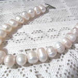 White Silver Tone Ringed Big Rice Pearl Bracelet
