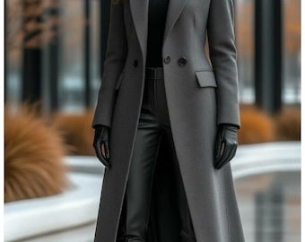May include: A long, gray wool coat with a tailored fit, worn over a black turtleneck and black leather pants. The coat features a double-breasted closure and is paired with black leather gloves and high-heeled boots. The overall style is sophisticated and modern.