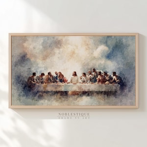 Puede incluir: Una impresión enmarcada de "La Última Cena" en estilo acuarela. La obra representa una mesa con figuras en un estilo suave y pictórico, sobre un fondo nublado y atmosférico. El marco es de color madera clara.