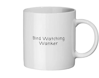 May include: White ceramic mug with a curved handle. The mug features the text "Bird Watching Wanker" in black, centered on the front. The mug is designed for beverages.