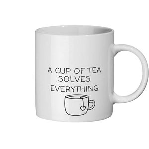 May include: White ceramic mug with the text "A CUP OF TEA SOLVES EVERYTHING" and a drawing of a teacup. The teacup has a heart-shaped tag. The mug has a curved handle.