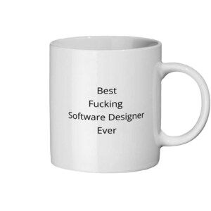 May include: White ceramic mug with a curved handle. The mug features the text "Best Fucking Software Designer Ever" in black, centered on the front. The mug is designed for hot beverages.