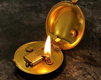 Encendedor de bolsillo vintage de latón: redondo, dorado, estilo queroseno, recargable.