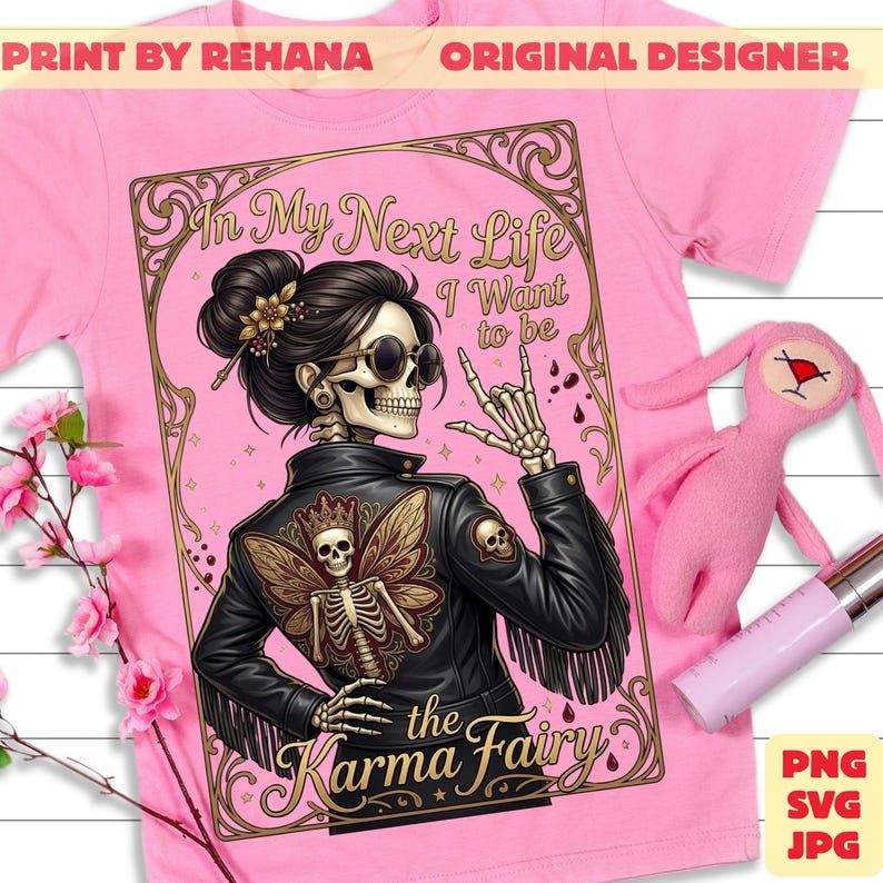 May include: Pink t-shirt featuring a graphic of a skeleton wearing sunglasses and a black leather jacket with a butterfly design on the back. The text reads "In My Next Life I Want to be the Karma Fairy."