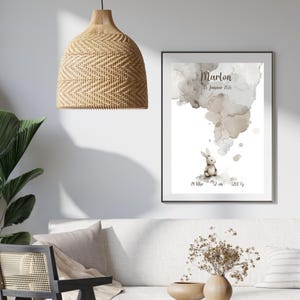 May include: A white ceramic mug with a black handle and the text "But First, Coffee" in a black, bold font. The mug is on a white surface.