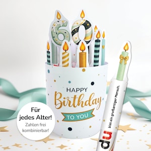 Könnte beinhalten: Eine weiße Geburtstagskarte mit goldenem Konfetti und der Aufschrift "Happy Birthday To You". Die Karte zeigt Pop-up-Kerzen und die Zahl "60". Eine separate Karte lautet "Du bist ein großartiger Mensch".