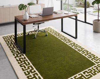 Handmade tufted wool rug in olive green and cream with a Greek key border