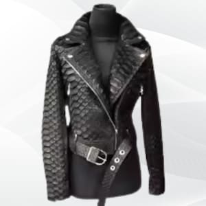 May include: A black leather jacket with a snakeskin pattern, displayed on a mannequin. The jacket features a notched collar, an asymmetrical zipper closure, and a belt with a silver buckle. The sleeves are long, and the jacket has a fitted silhouette.