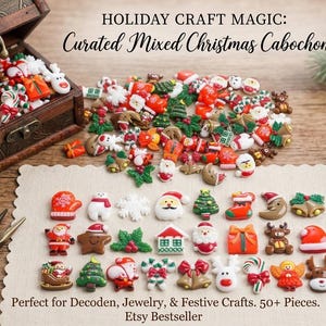 May include: A collection of small, colorful Christmas-themed cabochons featuring Santa, reindeer, trees, and gifts. The set includes over 50 pieces displayed in a wooden chest and on a scalloped mat, with text reading HOLIDAY CRAFT MAGIC.