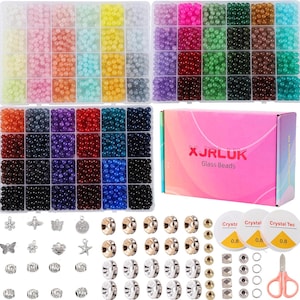 May include: A craft kit with a variety of colorful glass beads in a divided container. The kit includes charms, earring backs, beading wire, and scissors. The box reads "XJRLUK Glass Beads."