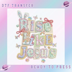 May include: A pastel-coloured DTF transfer design with the words "Rise Like Jesus." The design features bunny ears, butterflies, rainbows, and stars. The words "Ready to Press" are also included. The background has a soft, gradient colour scheme.
