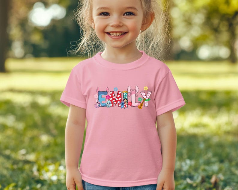 Ready to press custom name DTF transfer featuring bright multi-color text design for unique apparel.