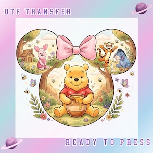 May include: DTF transfer with Winnie the Pooh and friends, including Piglet, Tigger, and Eeyore, in a whimsical design. A pink bow frames the image, with the text "DTF TRANSFER" and "READY TO PRESS".