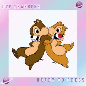 May include: DTF TRANSFER and READY TO PRESS text above and below a cartoon image of Chip and Dale, two chipmunks. Chip is brown and Dale is tan. They are leaning back-to-back with their arms around each other. The background is white with a pastel gradient.