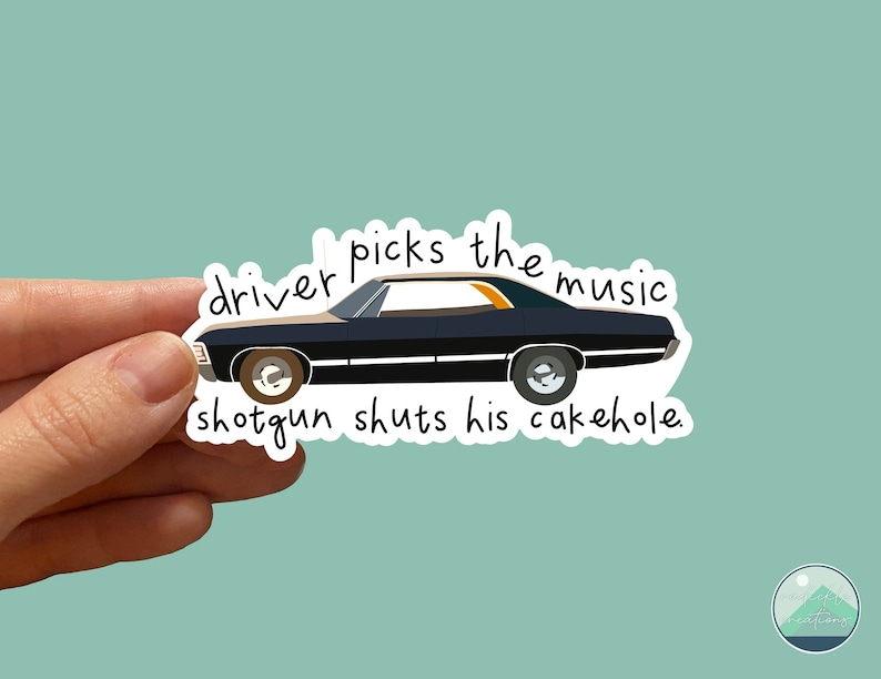 May include: A black and orange car sticker with the text "driver picks the music shotgun shuts his cakehole."