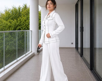 Witte linnen kostuumset dames, getailleerde blazer, wijde broek, outfit met contrasterend stiksel