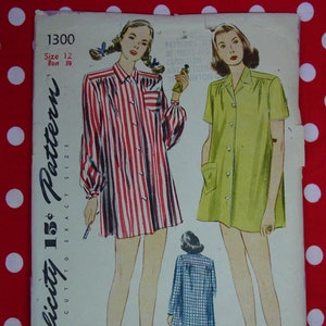 May include: Vintage Simplicity sewing pattern number 1300, size 12, bust 30. The pattern includes instructions for making a dress with a button-down front and short sleeves. The pattern is illustrated with three women wearing different versions of the dress.