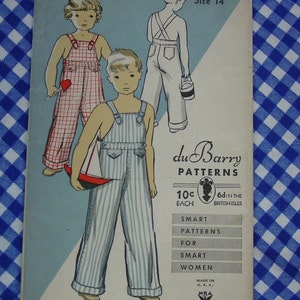May include: A vintage sewing pattern for children's overalls. The pattern is for size 14 and features two children wearing overalls. One child is wearing red and white striped overalls and the other is wearing blue and white striped overalls. The pattern is from du Barry Patterns and costs 10 cents.