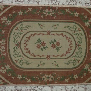 May include: A white ceramic mug with a black handle and the text "But First, Coffee" in a black, bold font. The mug is on a white surface. The mug is approximately 4 inches tall.