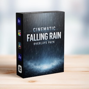 May include: A black box with the text "CINEMATIC FALLING RAIN OVERLAYS PACK" in white. The box has a rain effect design and icons for video editing software. The box is on a wooden surface.