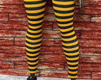 Fashion Doll-legging: oranje en zwarte strepen