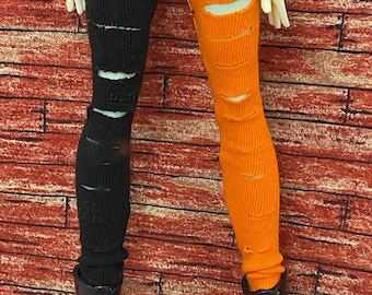 Leggings rotos de color naranja y negro