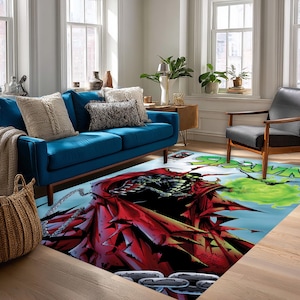 May include: A rectangular area rug featuring a graphic illustration of the comic book character Spawn. The design displays the character in a flowing red cape with black armor, silver chains, and a bright green energy cloud against a light blue sky.