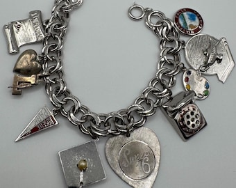 Vintage armband i sterlingsilver med gymnasieberömmelse: Examensberlock i pärla