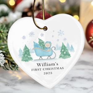 Personalized Baby&#39;s First Christmas Ornament 2025: Blue Sleigh Ceramic Keepsake